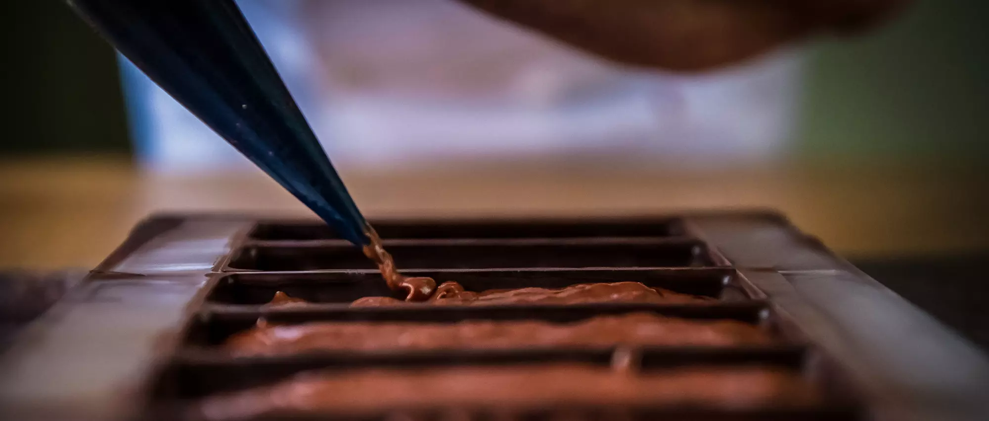 Ganache filling bars in Aurosó Oxfordshire Kitchen